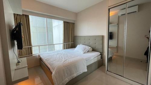 Pekayon Jaya Apartment | Apartemen Grand Kamala Lagoon by Choco Room