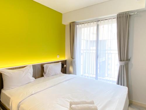 Cikarang Apartment | Best Modern 2BR at Meikarta Apartment By Travelio