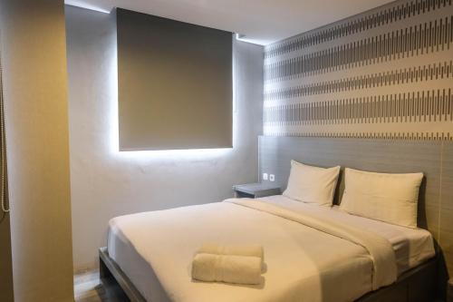 Ciputat Apartment | Brand New Studio Room at Bintaro Icon Apartment By Travelio
