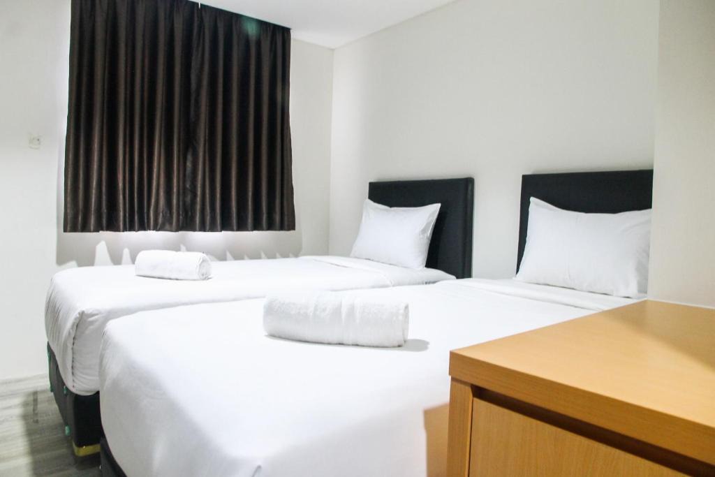 Ciputat Apartment | Cozy Studio Room Bintaro Icon Apartment By Travelio