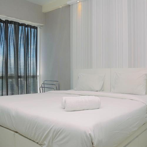 Pondokcina Apartment | Cozy Studio Room Taman Melati Margonda Apartment By Travelio