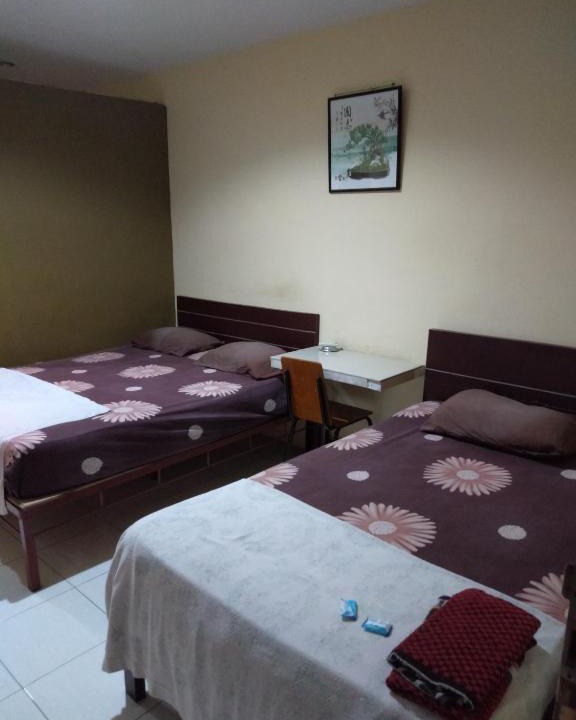 Kisaran Timur House | First Inn Hotel