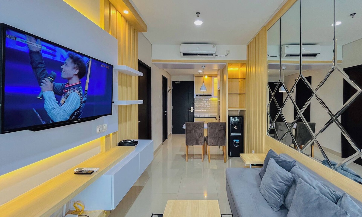 Mlati Apartment | Neat Warm Wooden Tone 1Br At Patraland Amarta Apartment