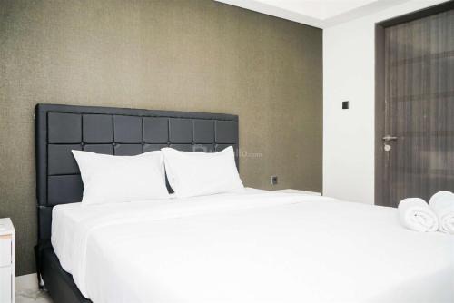 Pagedangan Apartment | Nice and Restful 1BR Apartment Carstensz Residence By Travelio