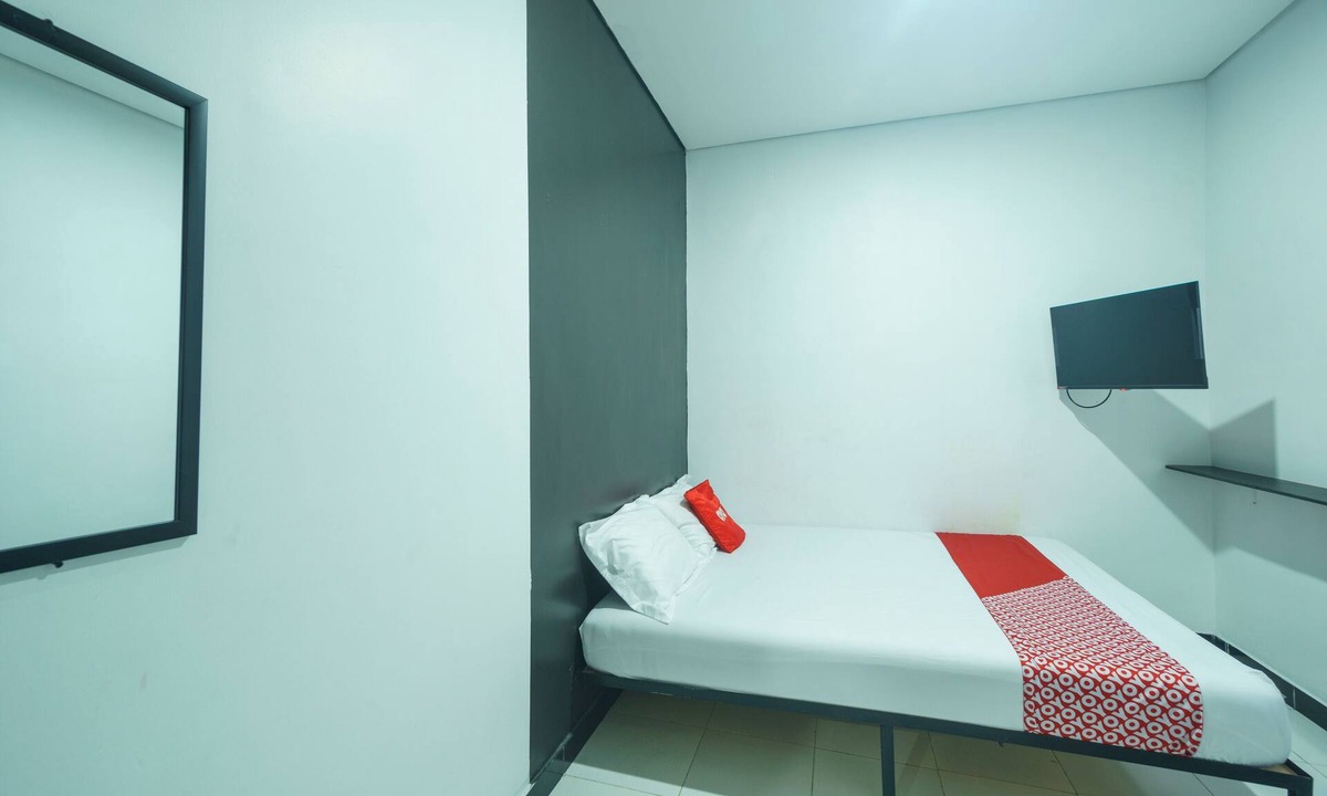 Duren Sawit Hotel | OYO 93133 Hotel Moraja Near Stikes Abdi Nusantara