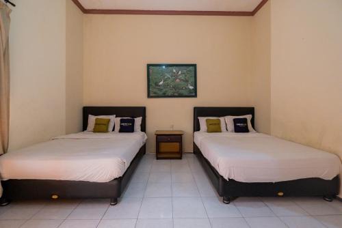 Oro Oro Ombo Hotel | Palereman Hotel RedPartner near Jatim Park 1