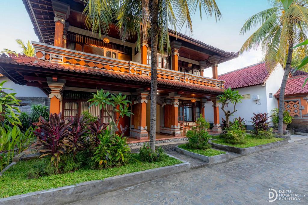 Tulamben Resort | Paradise Palm Beach Bungalows and Dive Center