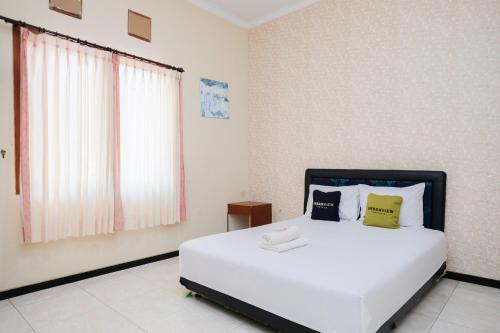 Klojen House | Urbanview Hotel Griya Surya Malang by RedDoorz