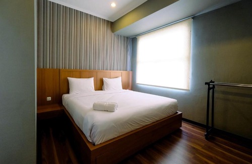 Pinang Apartment | 1BR Apartment with Study Room at Silkwood Residences By Travelio
