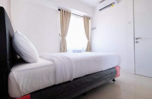 Jatinegara Apartment | 2 BR Bassura City Apartment with Mall Access By Travelio