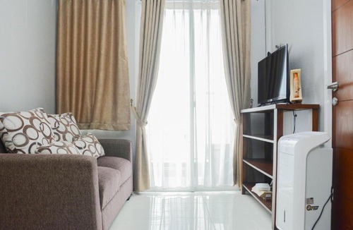 Pondokcina Apartment | 2BR Taman Melati Apartment near Universitas Indonesia By Travelio
