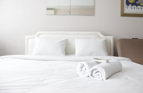 Hegarmanah Apartment | Bright Studio Room at Dago Suites Apartment near ITB By Travelio