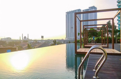 Pekayon Jaya Apartment | Chic And Cozy 2Br Grand Kamala Lagoon Apartment