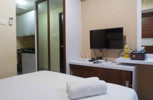 Surabaya Apartment | Compact Studio Room at Tamansari Papilio Apartment By Travelio