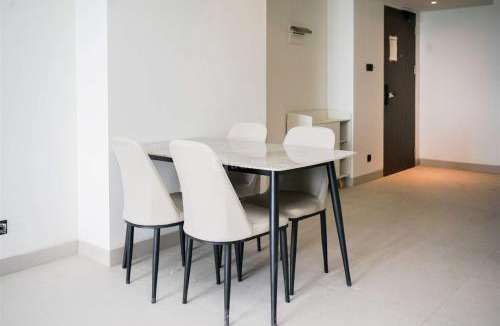 Pagedangan Apartment | Enjoy Living 2BR Apartment at Carstensz Residence By Travelio