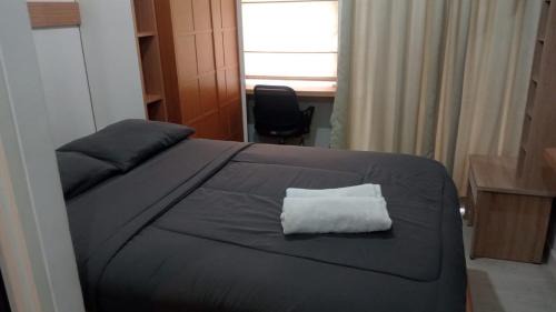 Bumi Serpong Damai Apartment | FREE WIFI, NETFLIX, SMART TV, MINERAL WATER, AMENITIES - Studio with Foldable Wall Bed at Serpong Garden Apt