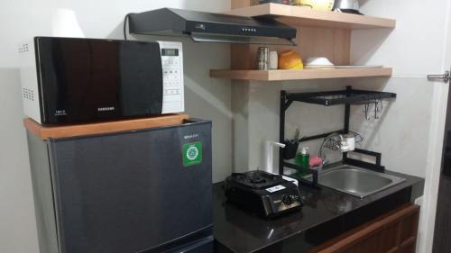 Bumi Serpong Damai Apartment | FREE WIFI, NETFLIX, SMART TV, MINERAL WATER, AMENITIES - Studio with Foldable Wall Bed at Serpong Garden Apt