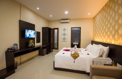 Legian House | Guest suite at Bisma House, with pool in Legian