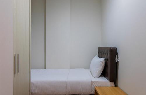 Pagedangan Apartment | Homey 2BR at 1st Floor Asatti Apartment By Travelio