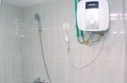 Cikarang Apartment | Homey and Minimalist Studio at Vasanta Innopark Apartment By Travelio