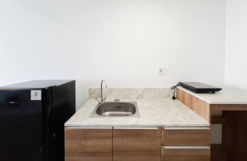 Panunggangan Utara Apartment | Homey Studio Room With City View At Apartment Collins Boulevard