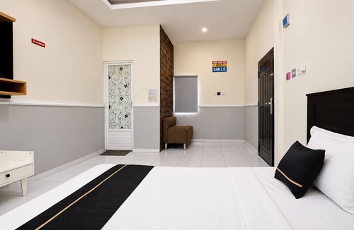 Rajabasa Hotel | Hotel O near Mall Boemi Kedaton 1