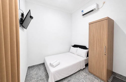 Dukupuntang Hotel | Hotel O near Mitra Plumbon Hospital