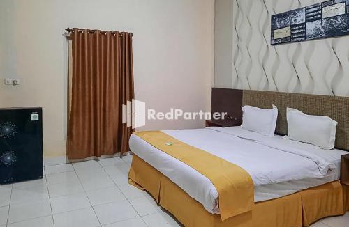 Sulawesi Hotel | Hotel Puri Yasmin Potowanua Lasusua Mitra RedDoorz