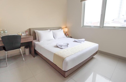 Bendungan Hilir House | LeGreen Suite Gatot Subroto