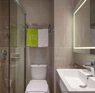 Bekasi Hotel | MaxOneHotels at Kota Harapan Indah-Bekasi