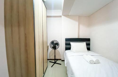 Cimahi Apartment | Minimalist 2BR with Pool View at Gateway Pasteur Apartment By Travelio