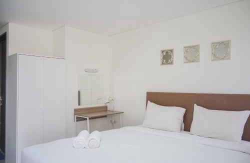 Pinang Apartment | Minimalist Studio Bintaro Icon Apartment near British School By Travelio
