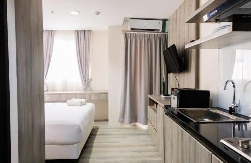 Pondok Aren Apartment | Minimalist Studio Room at Bintaro Icon Apartment By Travelio