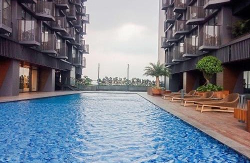 Pagedangan Apartment | Nice and Restful 1BR Apartment Carstensz Residence By Travelio