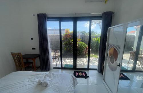 Kutuh House | Orange Guest House room