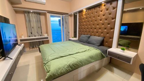 Surabaya Apartment | Orchard Tower with Netfix by AquHome