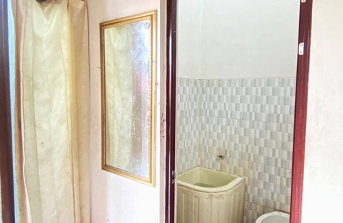 Dinoyo Hotel | OYO 95235 Griya Manisa Homestay Syariah