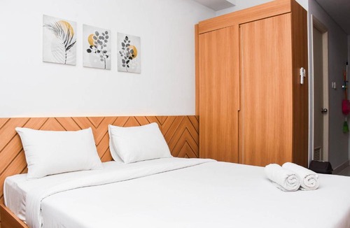 Bekasi Apartment | Pleasant Studio Patraland Urbano Apartment near Station By Travelio