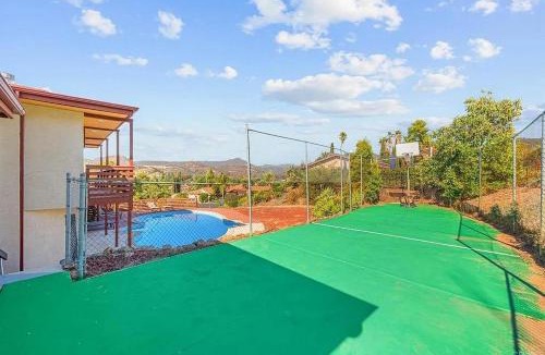 East Grove House | Private 5-Bedroom Estate with Mountains Views, Pool & Basketball Court, Relax & Play!