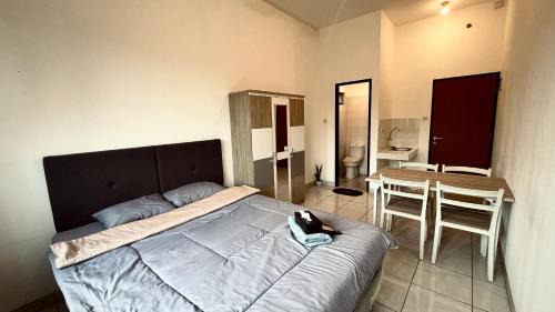 Ciakar Apartment | RoomQu at Ecohome Citra Raya