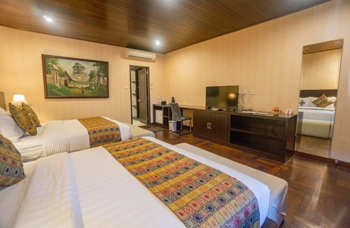 Dewi Sri Hotel | SL1001 - 1 Bedroom Family Quadruple Suite in Legian