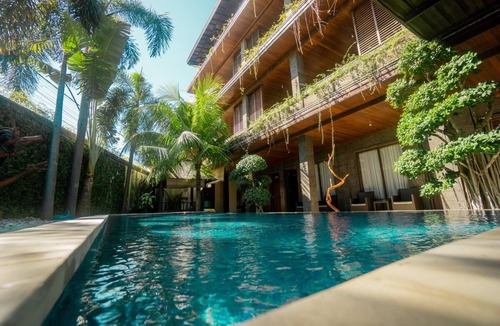 Dewi Sri Hotel | SL1002 - 1 Bedroom Deluxe Suite in Legian