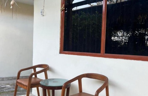 Candi Dasa House | Smiley Rooftop Homestay & Restaurant