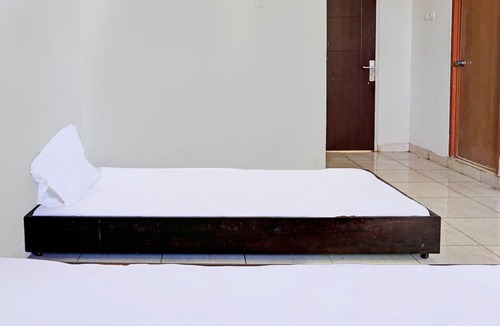 Malang Hotel | SPOT ON 92374 Penginapan Rusunawa