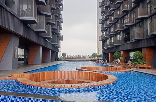 Pagedangan Apartment | Studio Apartment With Sofa At Carstensz Residence
