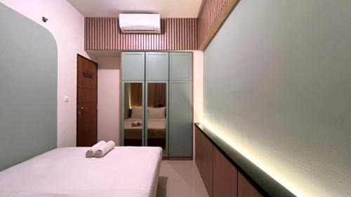 Panakkukang Apartment | Warm and Homey 2BR at Vida View Makassar Apartment By Travelio