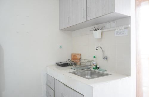 Depok Apartment | Warm and Tidy Studio at Cinere Resort Apartment By Travelio
