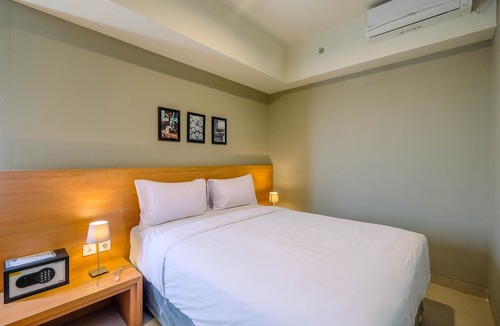 Cikarang Hotel | Wonderful 1Br Apartment at Mustika Golf Residence with Golf View