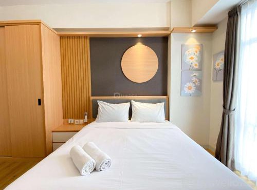 Best Homey 1BR at 52th Floor Vasanta Innopark Apartment By Travelio in Cikarang