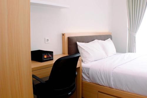 Comfort 1BR at Vasanta Innopark Apartment By Travelio in Cikarang